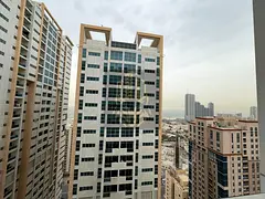 A golden opportunity for living and investment in Ajman a luxury apartment with a partial sea view i