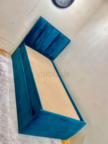 Single teal velvet bed frame with padded headboard and built in storage— good condition