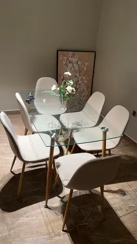 Glass Top Dining Table with 6 Beige Upholstered Chairs