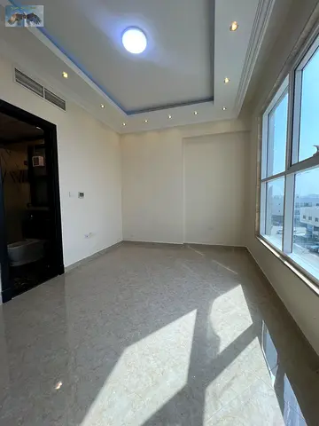 2BR apartment, second tenant, 1 month free, free parking, flexible payments, prime location near Sharjah & Dubai exit, super deluxe finishes.