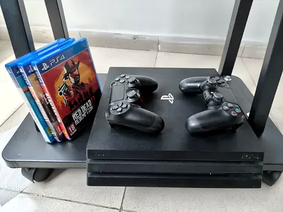 Sony PS4 Pro 1 TB with 2 Controllers and 3 PS4 Games (Excellent Condition)