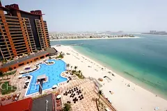 FULL OCEAN AND PALM VIEW | MID-FLOOR | WATERFRONT