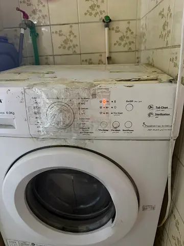 Used front-load washing machine - functional, some cosmetic wear