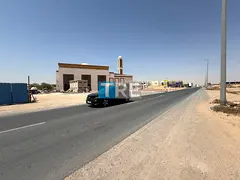 COMMERCIAL LAND FOR SALE ON MAIN ROAD AL HELIO 2 AJMAN