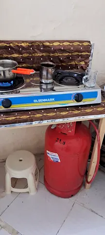 Gas cylinder with regulator , pipe and stove