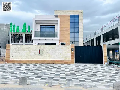 فيلا فاخرة للبيع مع مسبح خاص في عجمان، منطقة الحليو 2 | ملكية حرة لجميع الجنسيات، شاملة رسوم التسجيل والتملك