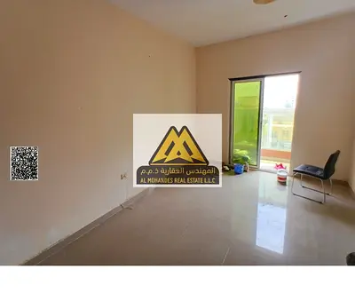 2BR apt in Al Nuaimiya 2 Ajman. Spacious, 2 baths, balcony, family building. AED 35,000 yearly, 4/6 payments. Prime location.