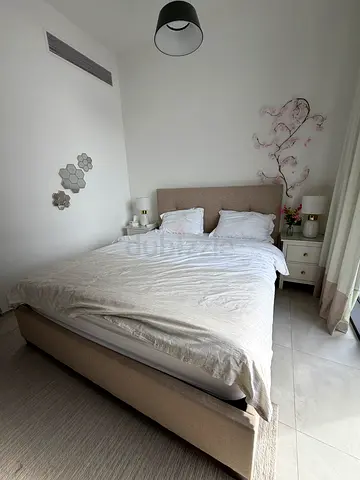 Beige upholstered double bed frame with headboard built in Bluetooth speakers - excellent  condition