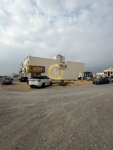 للبيع ارض سكني تجاري في منطقه الحوشي ضاحيه البديع اماره الشارقه  مساحه6006 قدم مربع  في موقع ممتاز جدا تاني قطعه من شارع مليحه العام