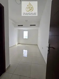 A 3-bedroom apartment with a hall available for annual rent in Al Jurf 2, located behind Safeer Mall