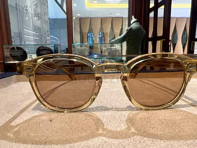 Transparent amber frame sunglasses with brown lenses - gently used