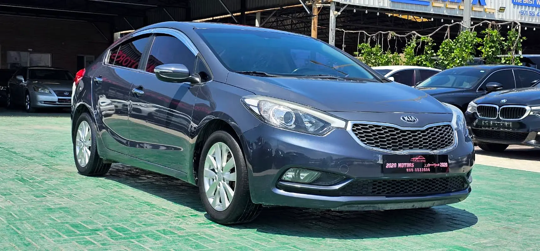Kia K3 2014 — photo 1 of 10