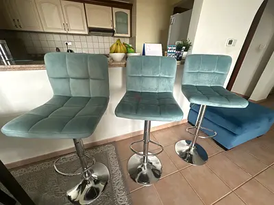 Set of 3 adjustable mint velvet bar stools with chrome base