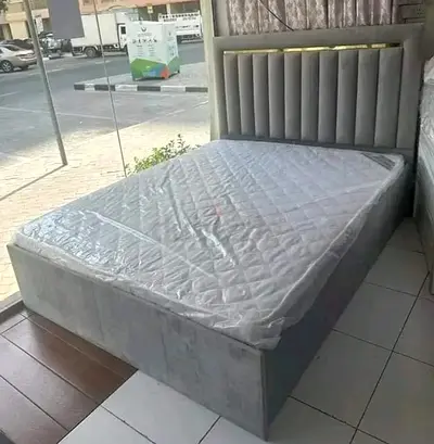 Brand New Grey upholstered Queen size bed with tall tufted headboard