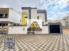 Located in the Al Helio 2 area, this villa enjoys a prime location on a main street with a large set