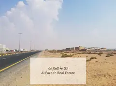 Industrial land for sale, corner plot in Al Sajaa
