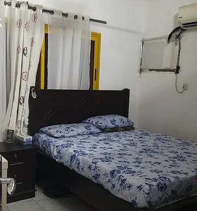 Room in apartment for rent in Al Karama