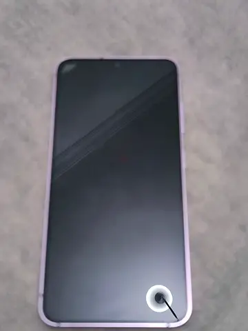 Used pink Samsung smartphone with case - good condition