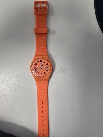 Peach silicone analog wristwatch - good working condition