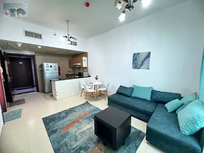 Furnished 1-bedroom apartment with a living room in City Tower, located directly on Khalifa Street in a prime location, close to Safeer Mall and oppos
