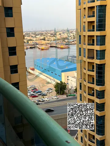 عرض حرق | أكبر شقة غرفتين وصالة بإطلالة بحيرة في أبراج الخور