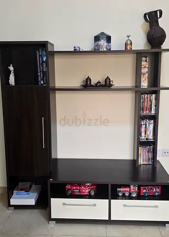 Dark wood entertainment TV unit with shelves and drawers