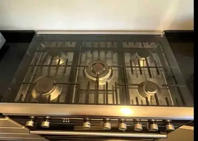 Used stainless steel 5-burner gas hob with oven (good working condition)