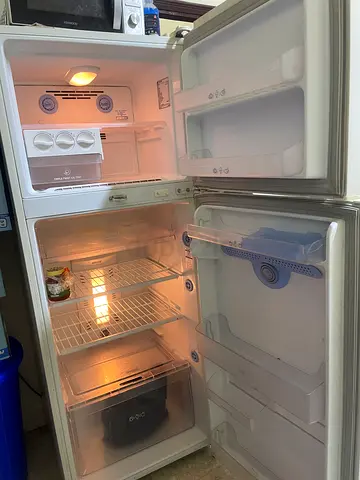 double-door refrigerator with top freezer - good working condition