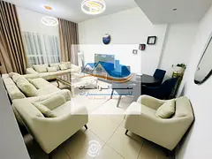 Al Sharqa Khan, Rose Tower, one-bedroom apartment with a living room, two bathrooms, a kitchen, and