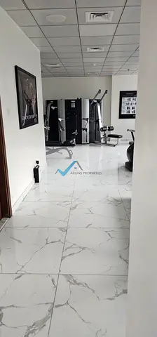 شقة فاخرة للإيجار مكونة من غرفتي نوم وصالة | مفروشة بالكامل | موقع مميز في أبراج أواسيس 1 | برج سكني فاخر للعائلات | شقة واسعة مكونة من غرفتي نوم وصال