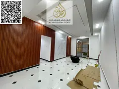 Two bedrooms and a living room, high-end finishing, two bathrooms with a balcony in Al Rawda 3, near