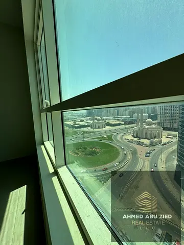 Luxury apartment for annual rent in Sharjah, Al Khan, near Al Khan Bridge. Two master bedrooms, spacious living room, three bathrooms, free parking, p