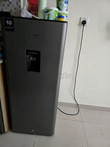 Hisense single-door fridge with water dispenser - very good condition