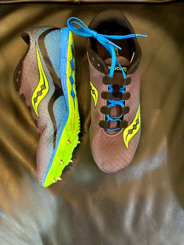 Running spike shoe