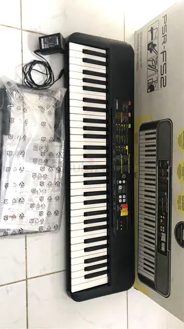 Yamaha PSR-SS2 61-Key Portable Keyboard with Power Adapter and Stand