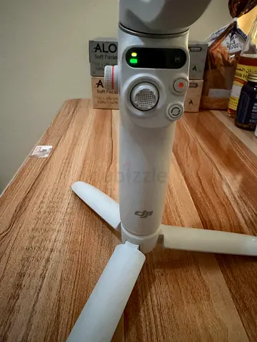 DJI Osmo Mobile Handheld Gimbal with Mini Tripod - Good Working Condition