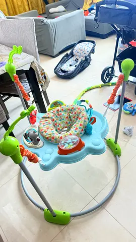 Baby activity jumper/exersaucer with toys - good condition