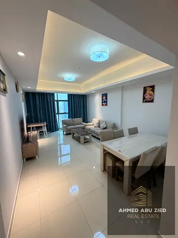 Luxury furnished 2BHK for annual rent in Rashidiya 1 Ajman Gulfa Towers balcony free parking gym pool garden 72k yearly 4 cheques