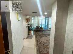 Furnished apartment for monthly rent in Ajman, Corniche Residence Towers, sea view, two bedrooms and