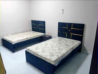 Brand New single beds with headboards and mattresses