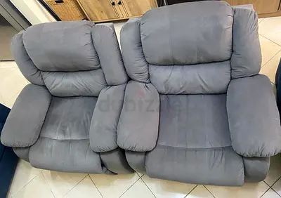 Pair of grey fabric reclining armchairs - comfortable two-seater set