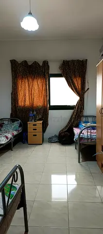 Executive bed space available for working ladies in a clean, well-maintained apartment at sharjah