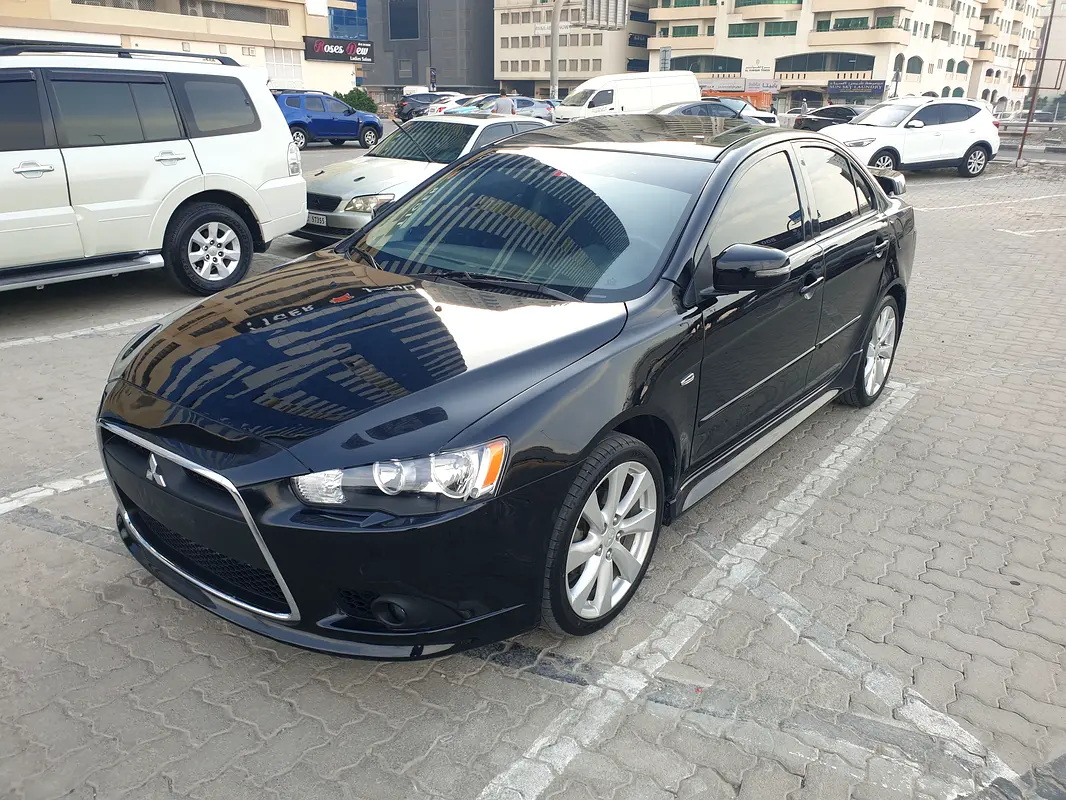 Mitsubishi Lancer 2015 — photo 1 of 12