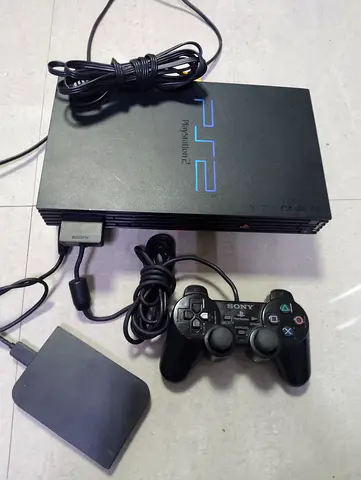 Playstation 2 Fat with loaded 120+ games