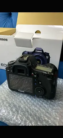 Used Canon EOS DSLR body with original box - good condition