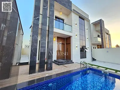 Villa with swimming pool for sale in Al Bahia area, Ajman. Excellent location. Registration fees included. Freehold ownership.