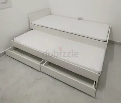 Ikea slakt bed frame with under bed and 2 storage drawers underneath with 2 Ikea mattresses is avail