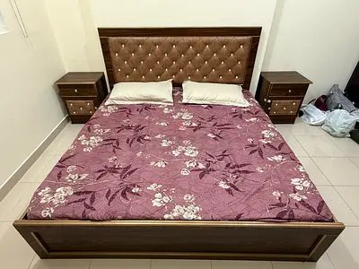 Queen bed frame with two matching bedside tables - good condition