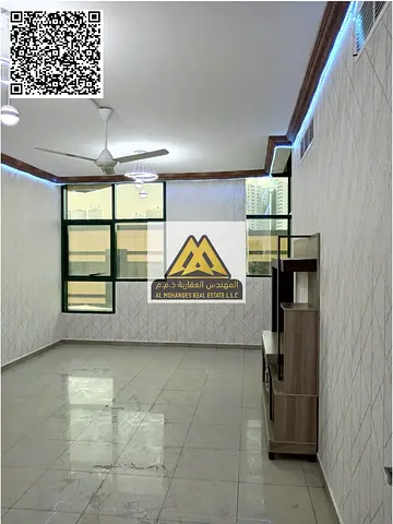 شقة غرفتين وصالة للإيجار السنوي في أبراج الراشدية عجمان، تتميز بمساحة كبيرة وتصميم مريح مع بلكونة بإطلالة جميلة، في موقع حيوي يوفر جميع الخدمات ومناسب