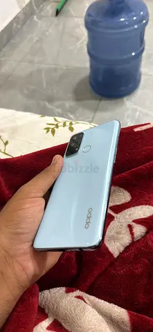 OPPO smartphone - good condition, light blue, dual rear cameras